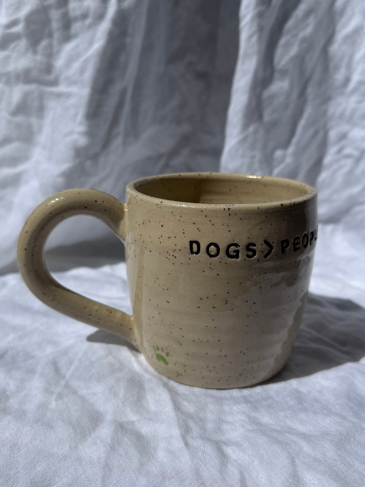 Dogs better than people - paw prints